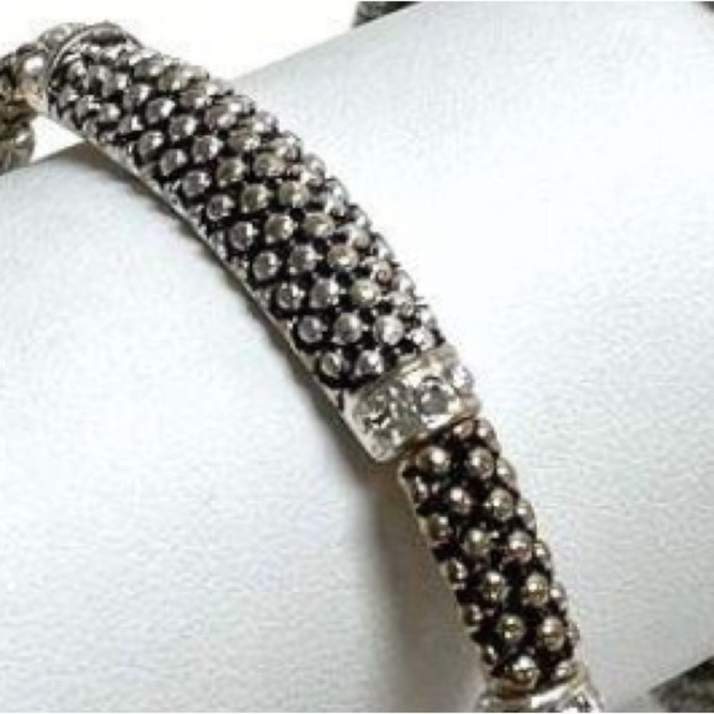 Silver caviar stretch bracelet with rhinestone accents